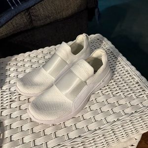 Womens size 10 APL athletic sneakers gently used